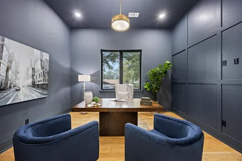 a room with granite countertop furniture a sink a window and a couch