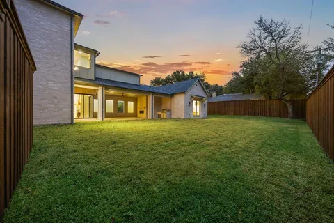 a house view with garden space