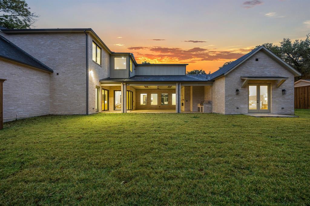 4208 Allencrest Lane Dallas, TX 75244 - Photo 39 of 40 a front view of a house with a garden