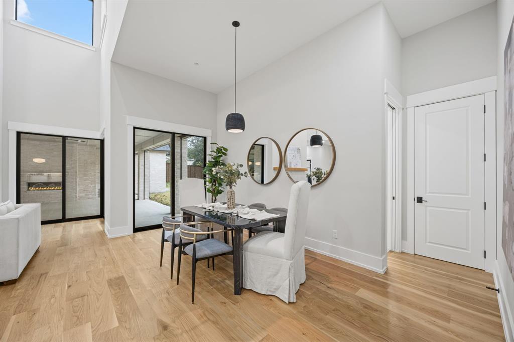 4208 Allencrest Lane Dallas, TX 75244 - Photo 7 of 40 a view of dining room filled with furniture and wooden floor