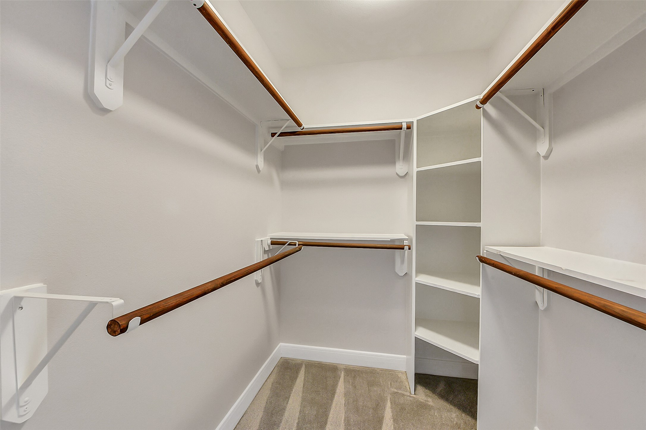3333 Allen Parkway, Unit 1609 Houston, TX 77019 - Photo 12 of 33 The secondary bedroom features its own impressive walk-in closet, complete with a custom organization system and plenty of shelving for effortless storage