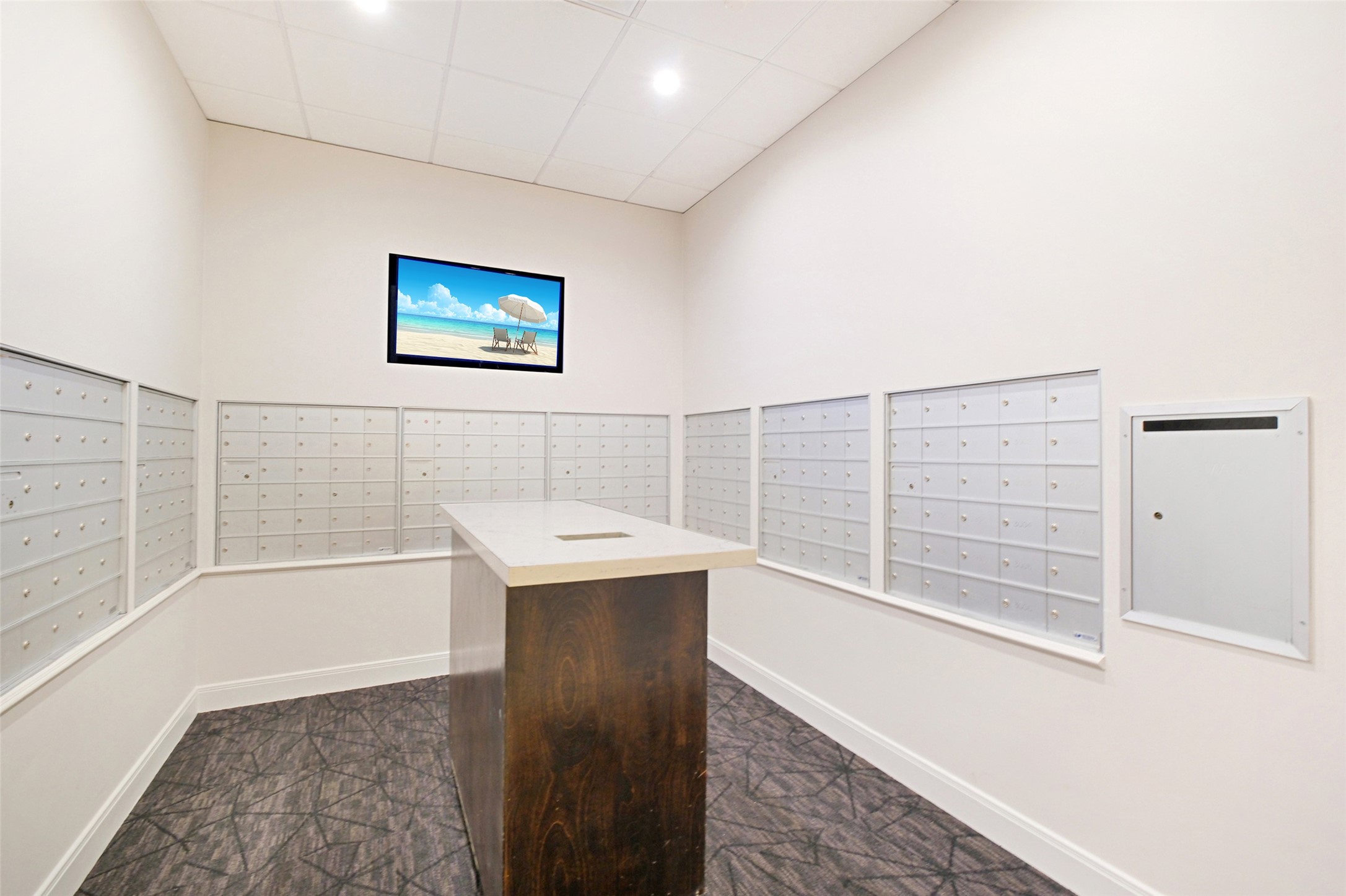 3333 Allen Parkway, Unit 1609 Houston, TX 77019 - Photo 24 of 33 Secure, climate-controlled mail room featuring private resident mailboxes and a dedicated package area