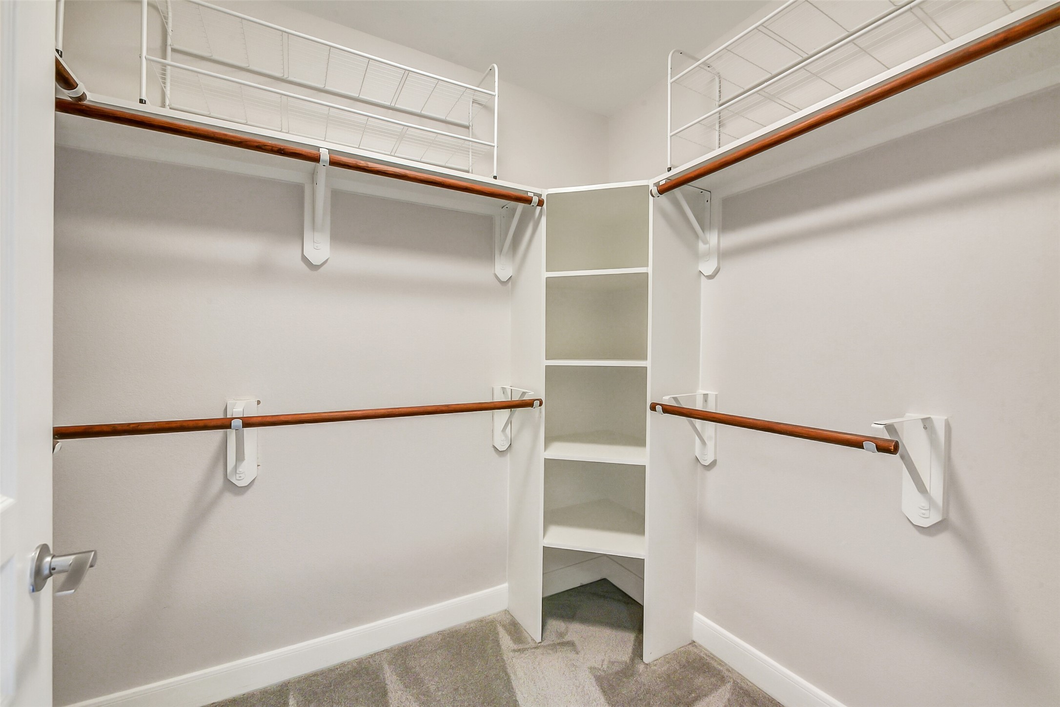 3333 Allen Parkway, Unit 1609 Houston, TX 77019 - Photo 9 of 33 The gracious primary closet features a custom-style organization system with ample hanging space and built-in shelving to accommodate any wardrobe