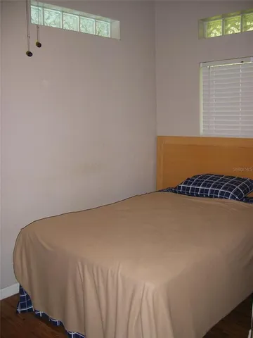 a bathroom with a toilet sink and shower