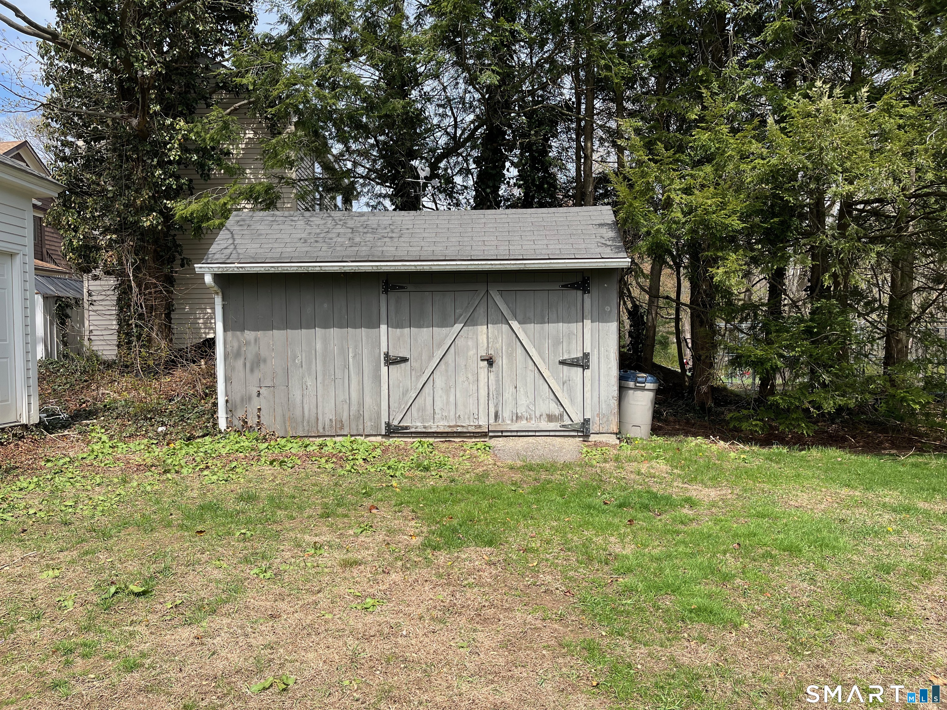 18 Addison Street Putnam, CT 06260 - Photo 32 of 33 back yard shed