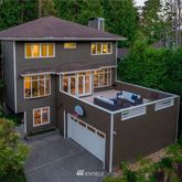 a front view of a house with yard