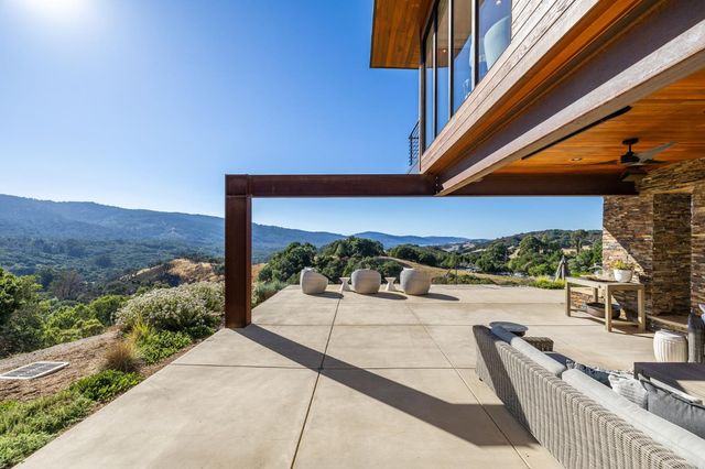 a outdoor living space with furniture and garden view
