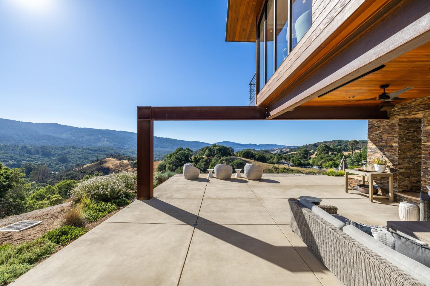 481 West Maple Way Woodside, CA 94062 - Photo 18 of 44 a view of a patio with a table and chairs