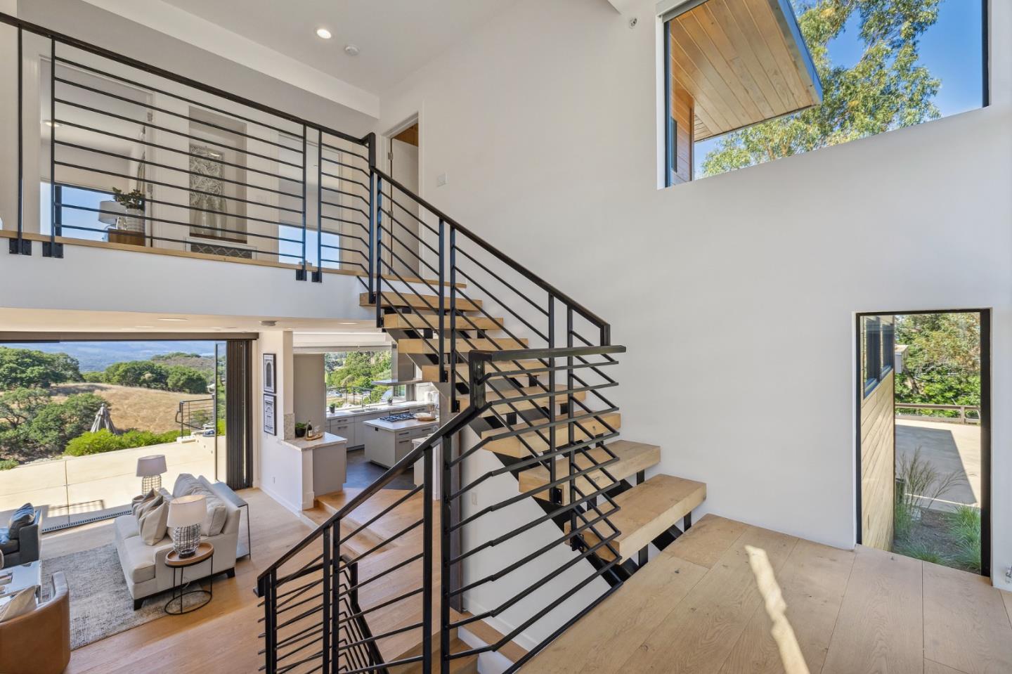 481 West Maple Way Woodside, CA 94062 - Photo 27 of 44 a view of entryway livingroom and hall with wooden floor