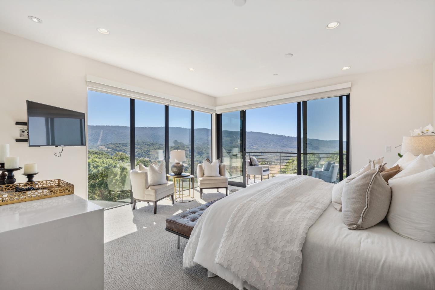 481 West Maple Way Woodside, CA 94062 - Photo 28 of 44 a large bedroom with a bed and large windows