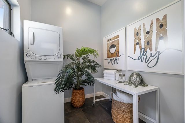 a view of an empty room with a cabinet