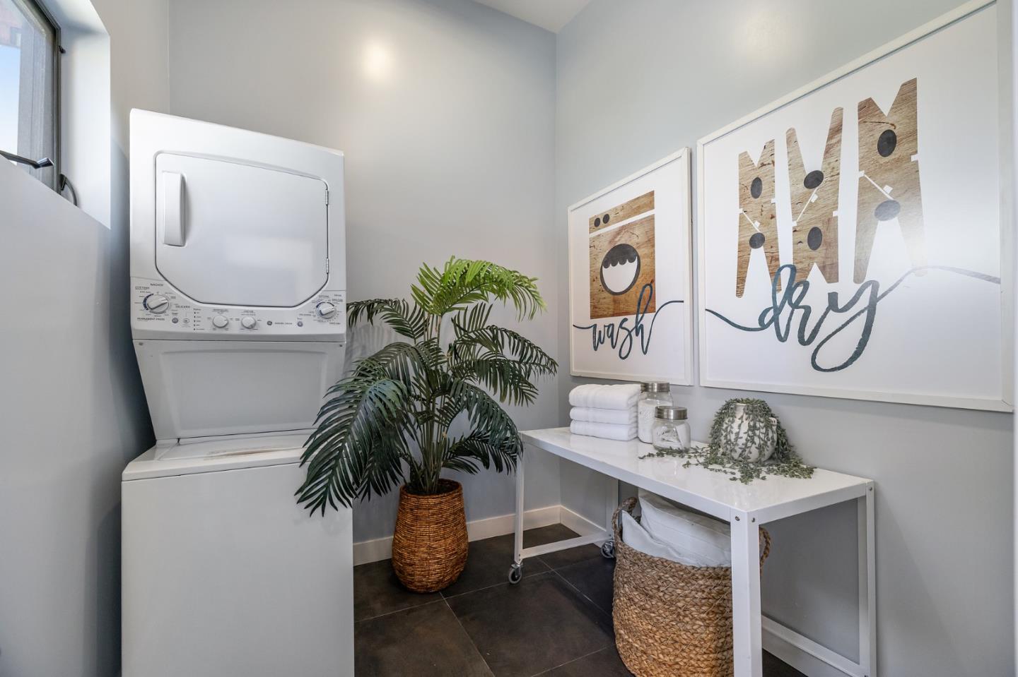 481 West Maple Way Woodside, CA 94062 - Photo 42 of 44 a hallway with a potted plant on a table and a potted plant