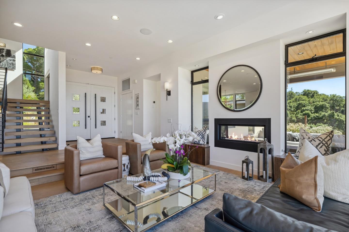 481 West Maple Way Woodside, CA 94062 - Photo 7 of 44 a living room with furniture a fireplace and a large window