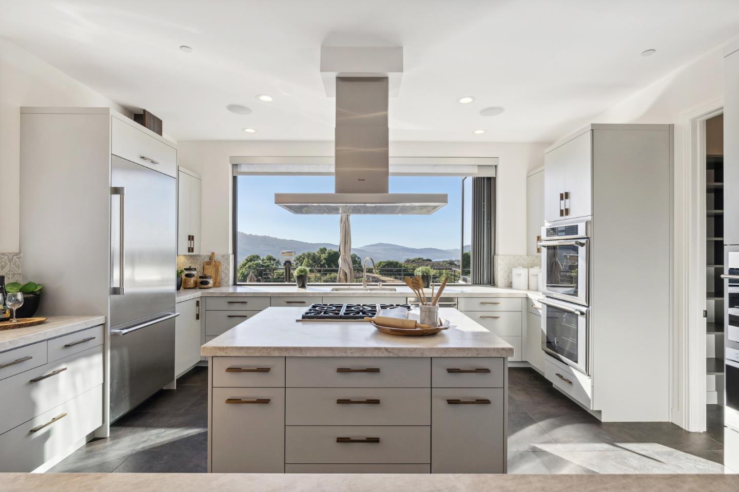 481 West Maple Way Woodside, CA 94062 - Photo 10 of 44 a kitchen with a stove a refrigerator and a view of living room