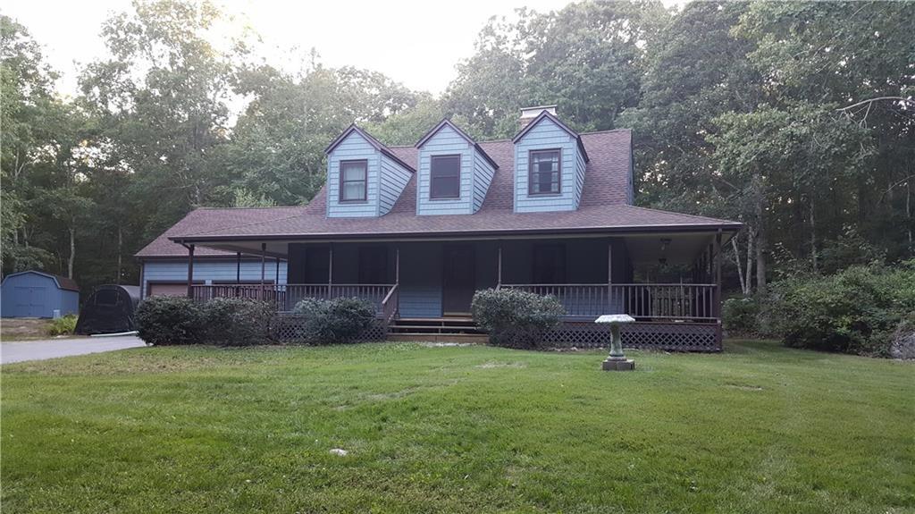 227 Haley Road Ledyard, CT 06339 - Photo 1 of 1 a front view of a house with a garden