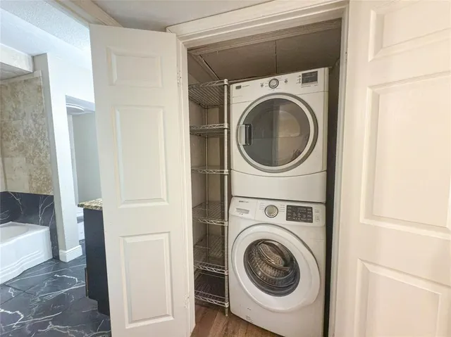 a utility room with dryer and washer
