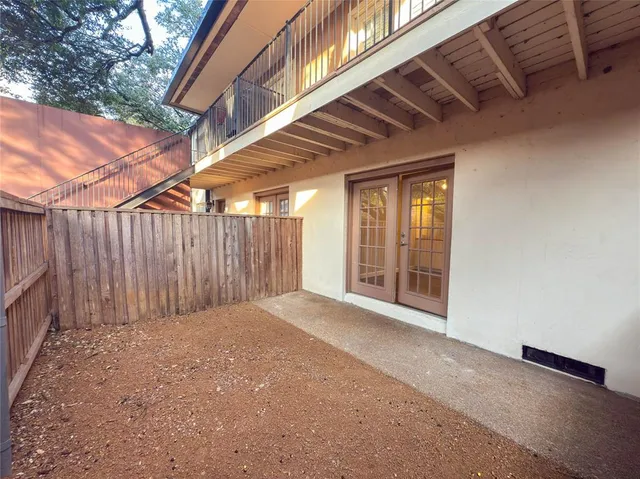 a view of a room with wooden walls