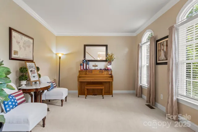 a room with furniture and a window