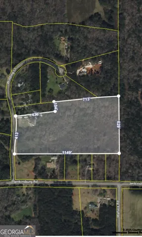 a picture of a bathroom with a shower curtain