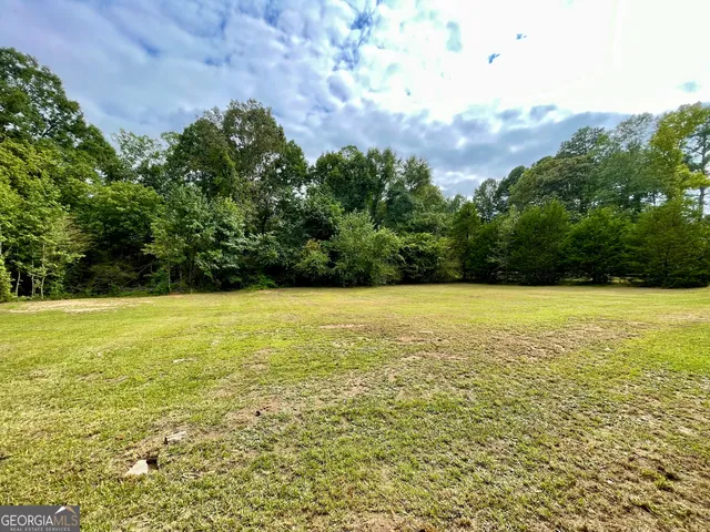 a view of an outdoor space with a lake view
