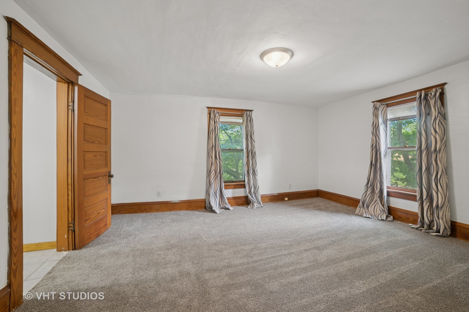 2S234 Harter Road Elburn, IL 60119 - Photo 13 of 24 an empty room with window and a ceiling fan