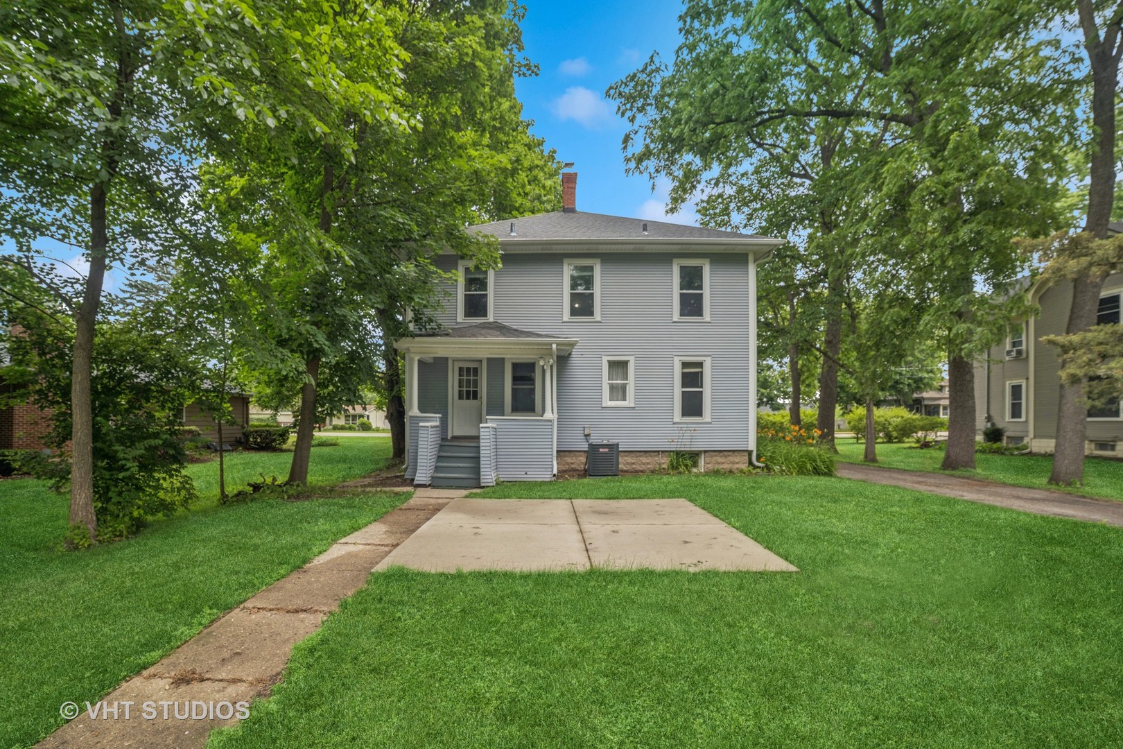2S234 Harter Road Elburn, IL 60119 - Photo 3 of 24 a front view of a house with a yard