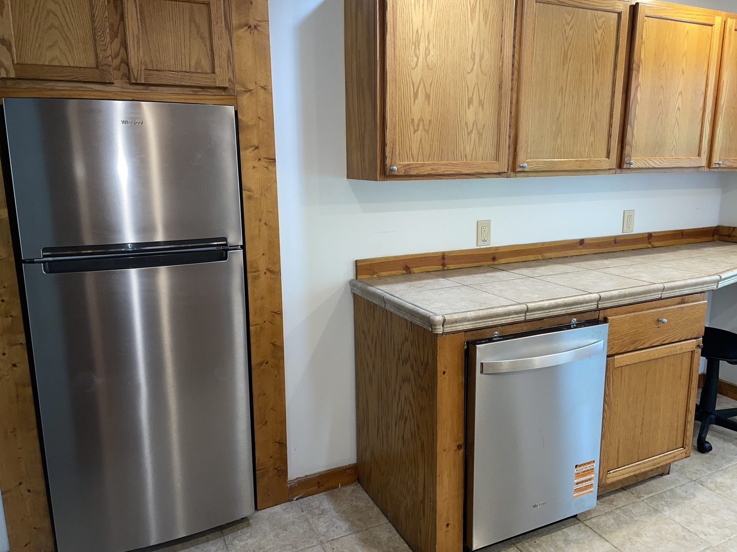 2S234 Harter Road Elburn, IL 60119 - Photo 5 of 24 a kitchen with metallic refrigerator freezer and a dishwasher