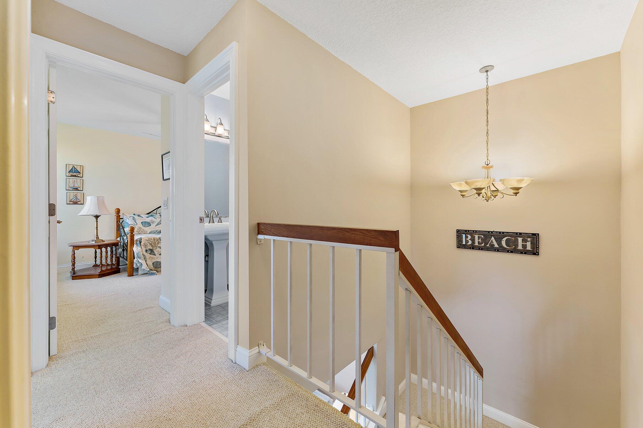 717 Highway 1, Unit 812 Jupiter, FL 33477 - Photo 13 of 41 a view of a hallway with a livingroom and entryway