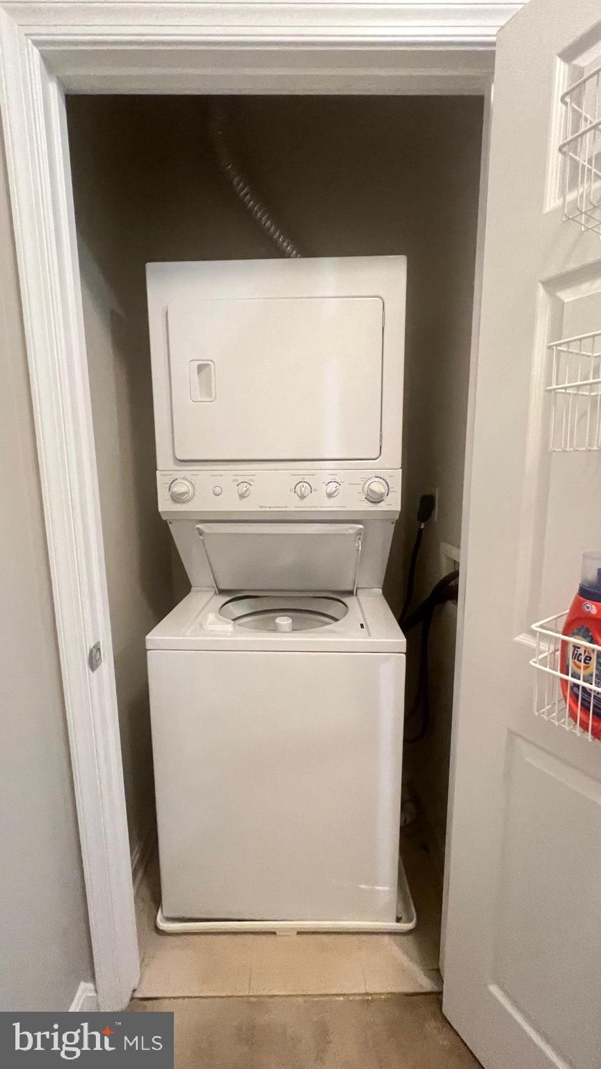 2726 Gallows Road, Unit 110 Vienna, VA 22180 - Photo 11 of 46 a utility room with dryer and washer