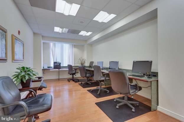 2726 Gallows Road, Unit 110 Vienna, VA 22180 - Photo 22 of 46 a view of a livingroom with workspace and a couch