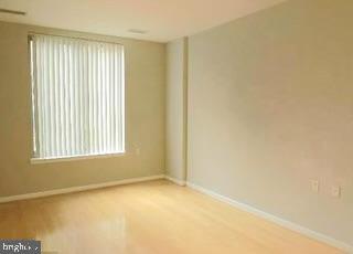 2726 Gallows Road, Unit 110 Vienna, VA 22180 - Photo 26 of 46 a view of an empty room with a window