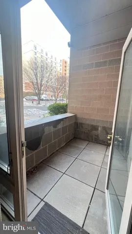 a bathroom with a bathtub and window