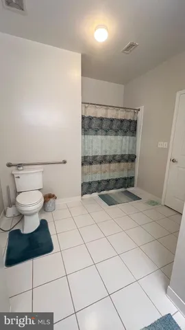 a bathroom with a sink and a shower