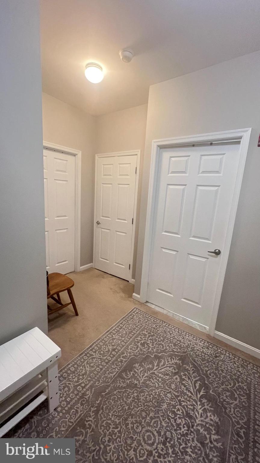 2726 Gallows Road, Unit 110 Vienna, VA 22180 - Photo 10 of 46 a room that has a bed and a window