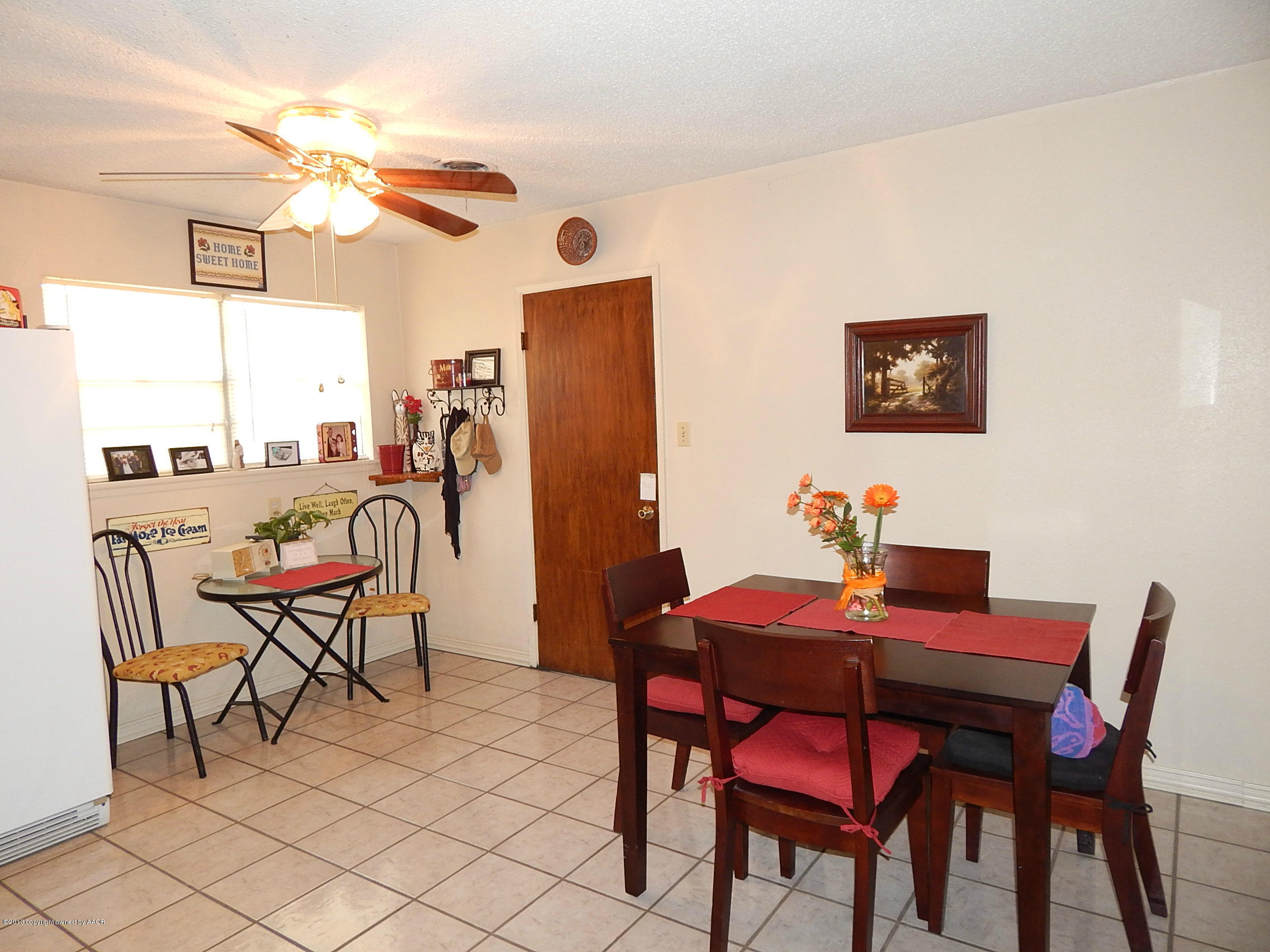 4700 South Milam Street Amarillo, TX 79110 - Photo 8 of 17 a dining room with furniture and window