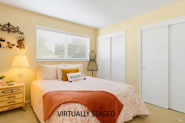 an aerial view of a house with a yard and garden