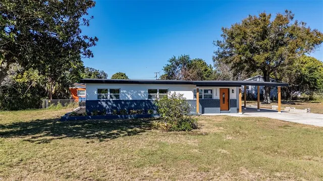 front view of a house with a yard