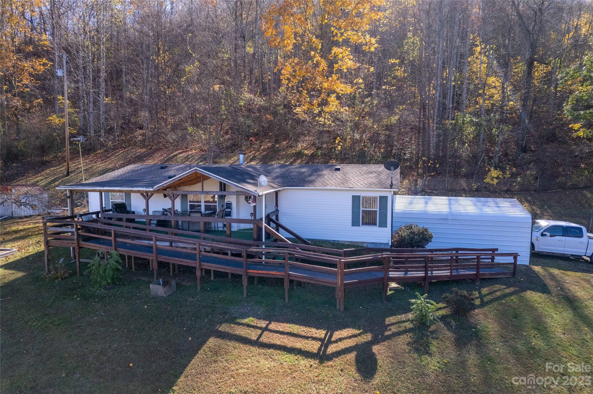 170 Painter Street Sylva, NC 28779 - Photo 2 of 48 a small pool with a table and chairs