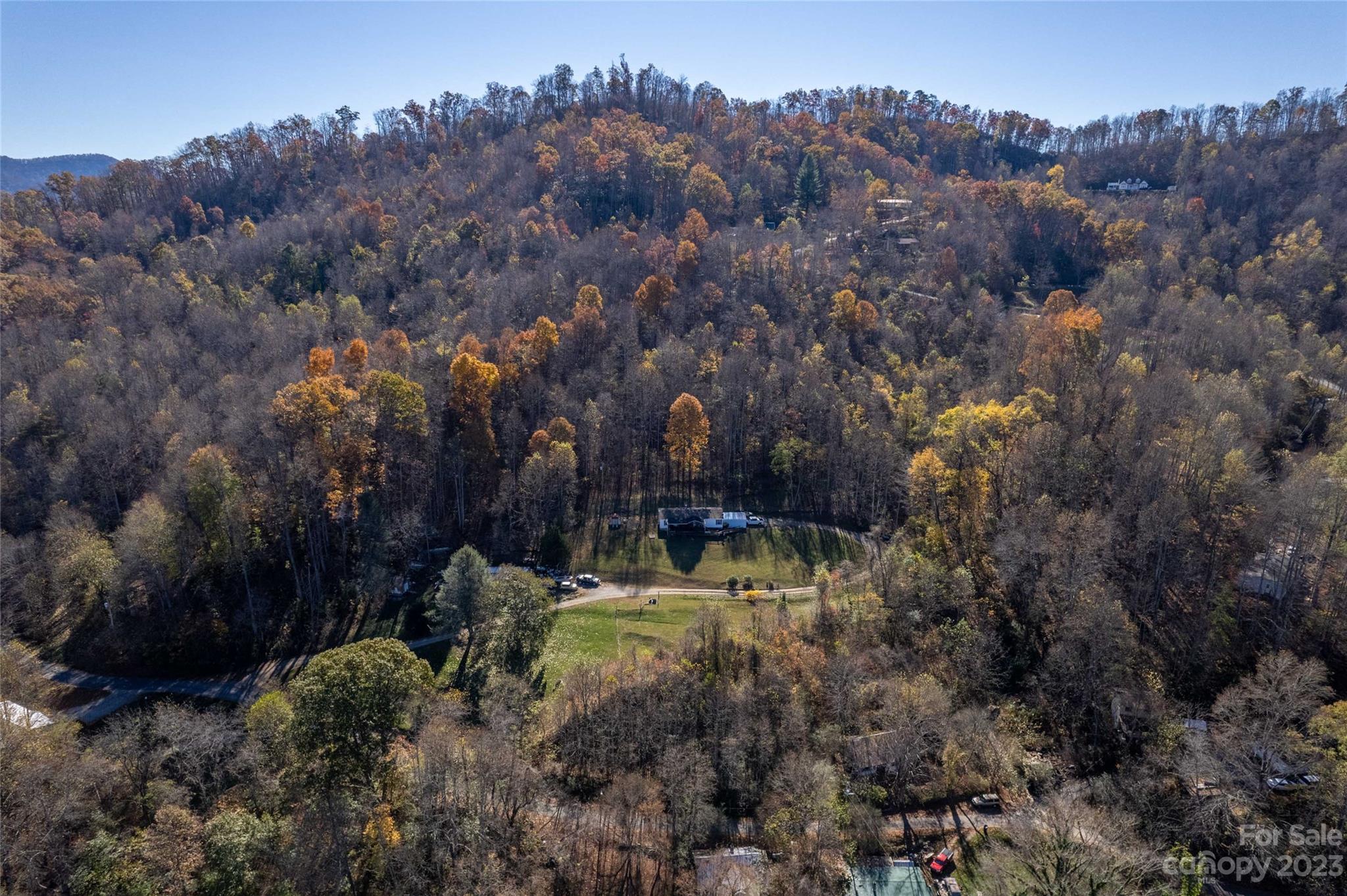 170 Painter Street Sylva, NC 28779 - Photo 26 of 48 an aerial view of a house with a yard