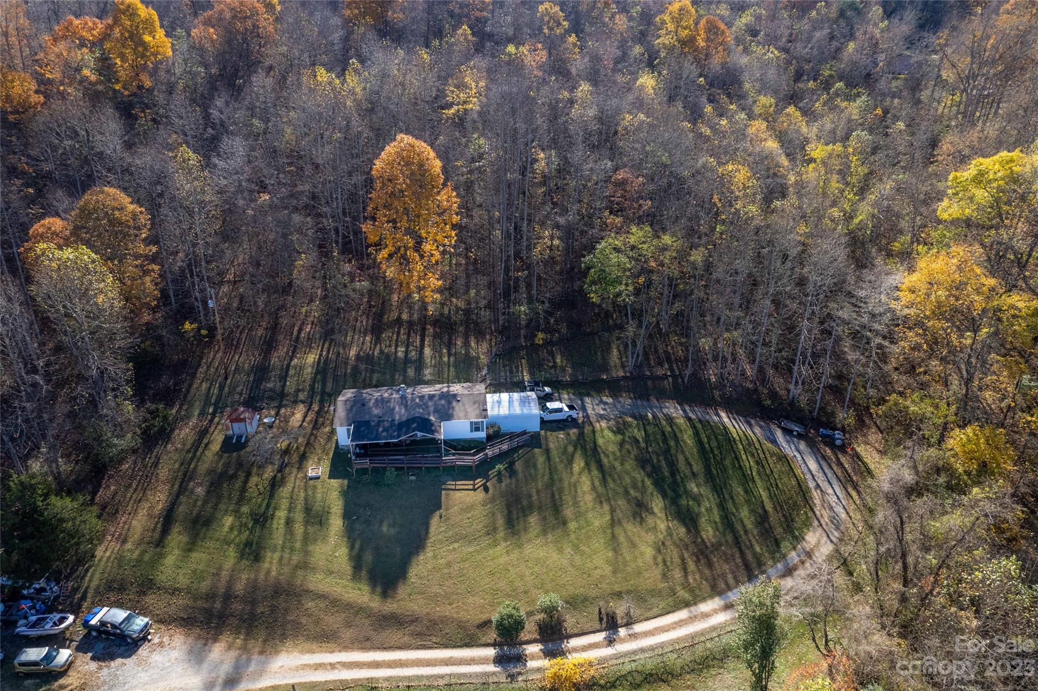 170 Painter Street Sylva, NC 28779 - Photo 29 of 48 a view of a swimming pool with a backyard and seating area