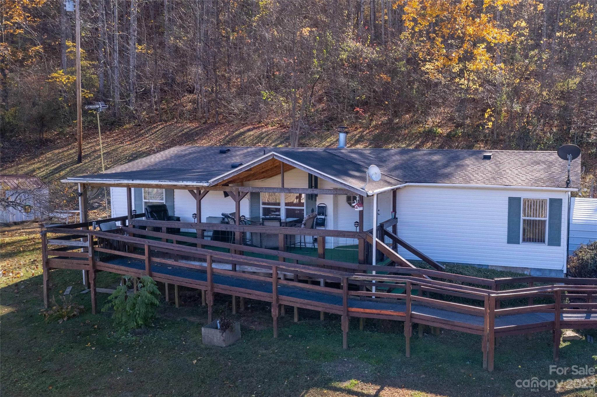 170 Painter Street Sylva, NC 28779 - Photo 3 of 48 a front view of a house with a yard
