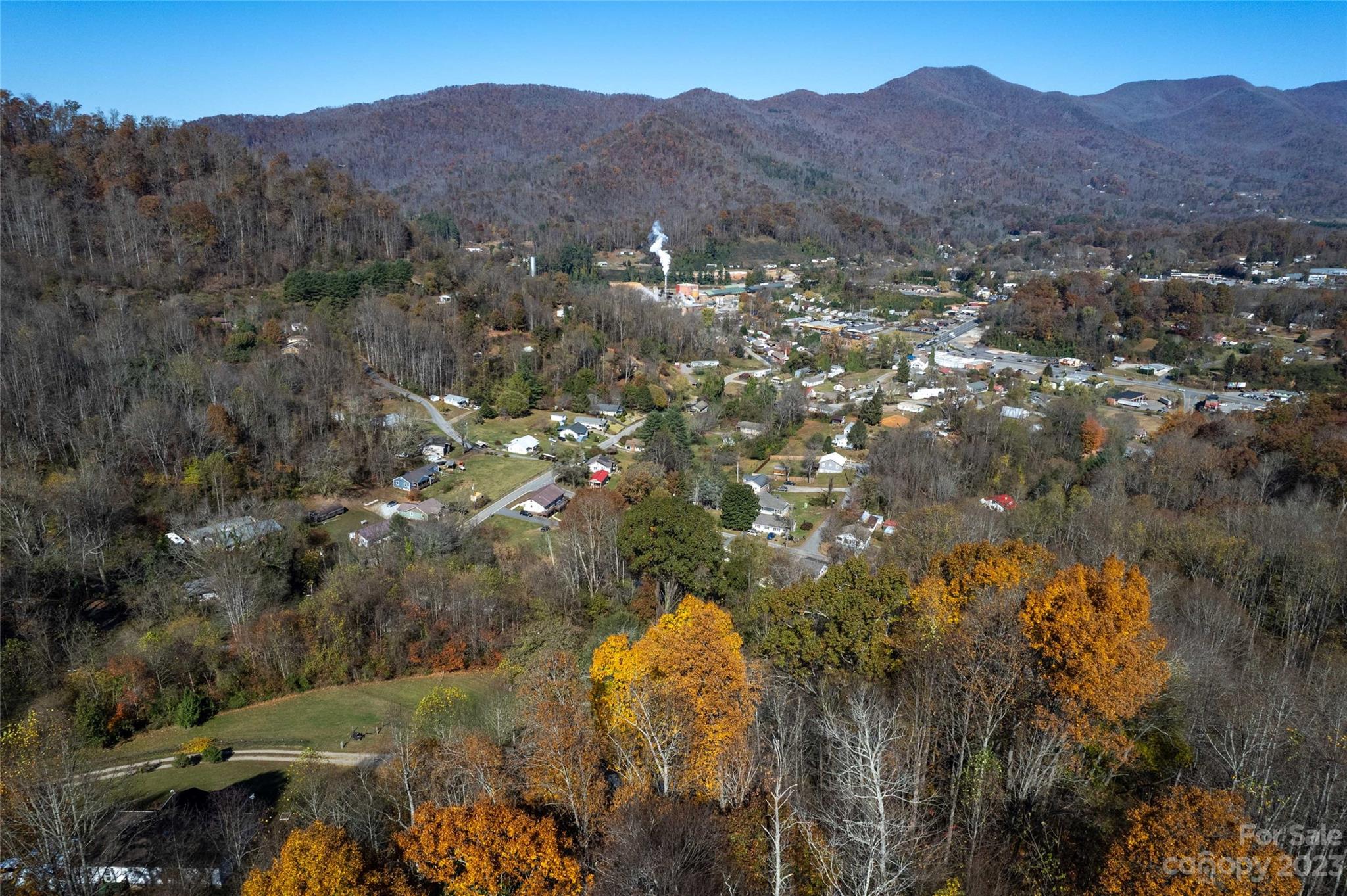 170 Painter Street Sylva, NC 28779 - Photo 34 of 48 a view of a town with mountains in the background
