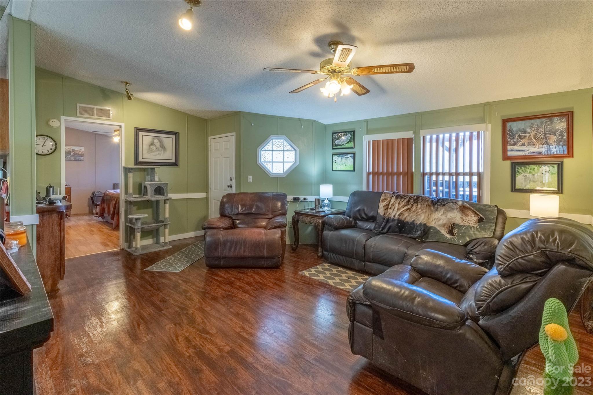 170 Painter Street Sylva, NC 28779 - Photo 4 of 48 a living room with furniture and a window