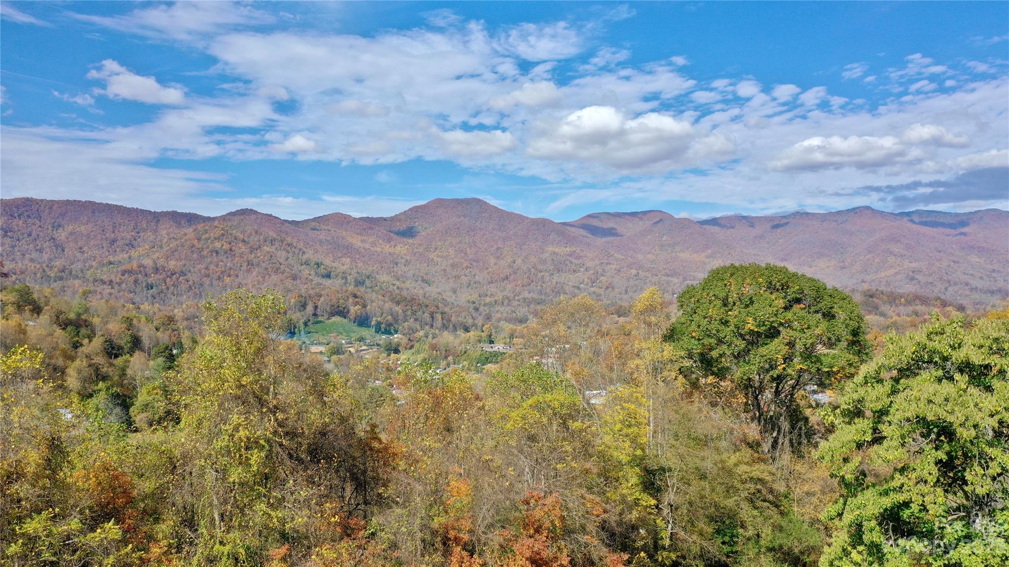 170 Painter Street Sylva, NC 28779 - Photo 48 of 48 a view of a city with mountain in the background