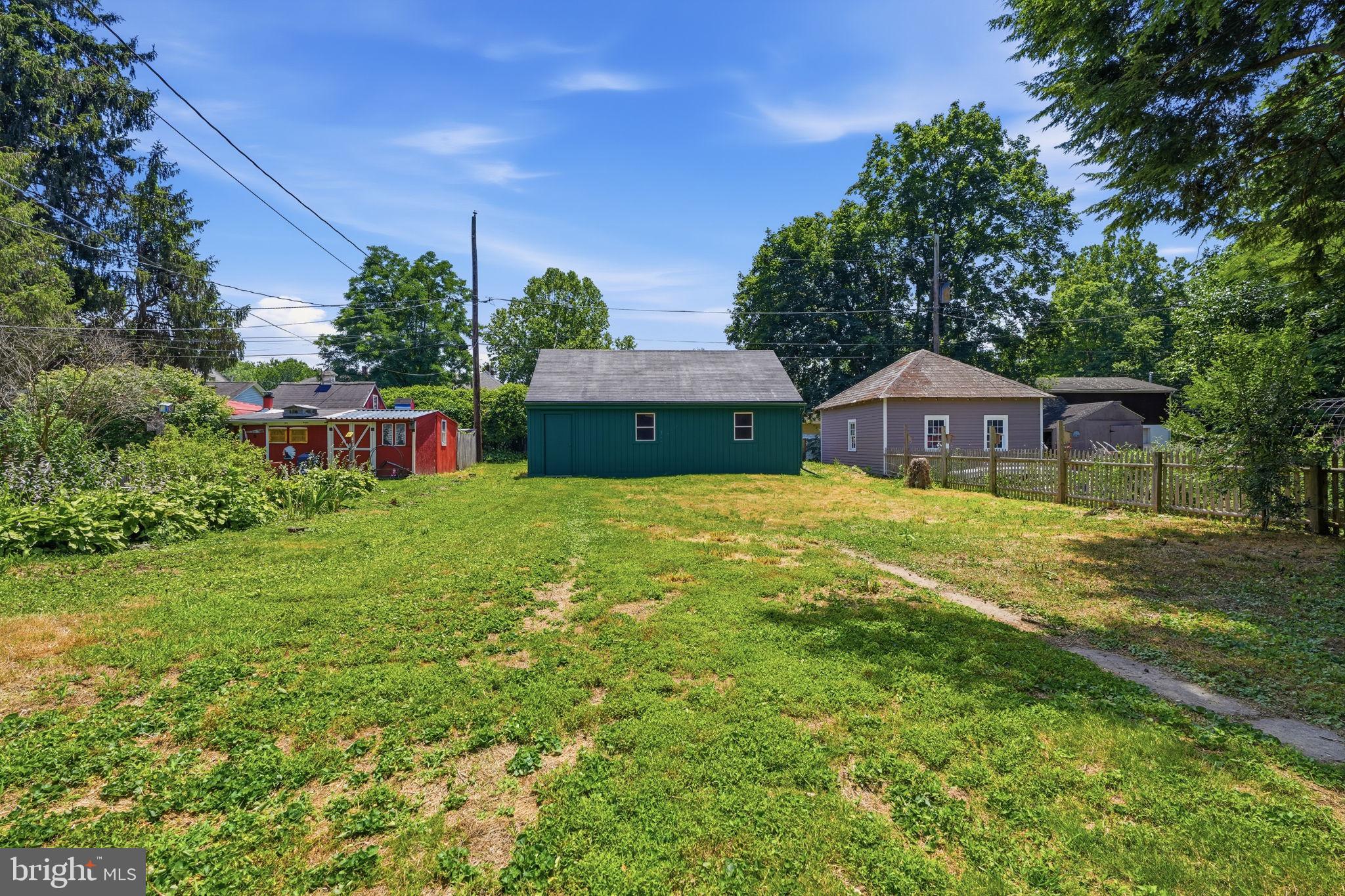 124 Cedar Road Riegelsville, PA 18077 - Photo 44 of 50 Spacious backyard with vibrant greenery.