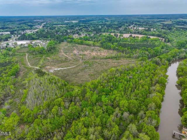 a view of a lake with a city