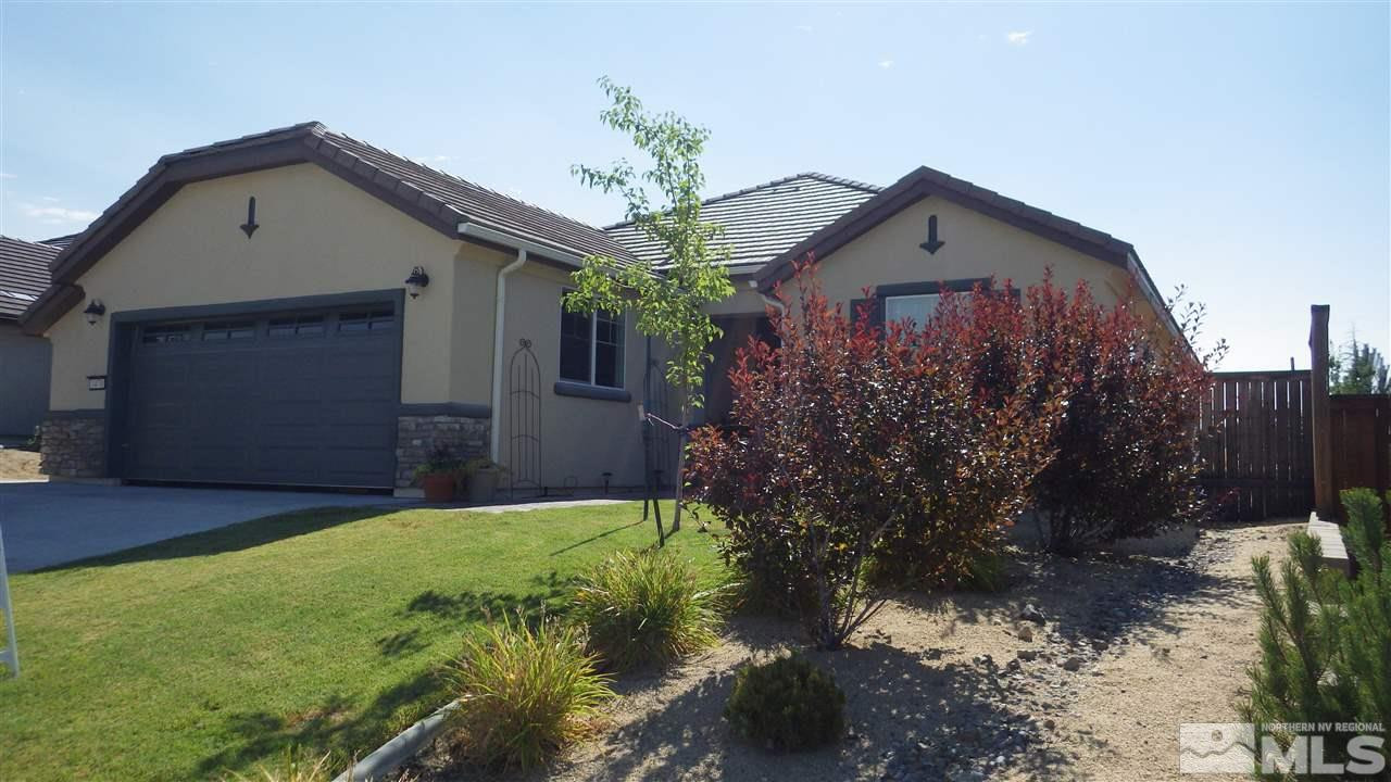 1470 Orchard Park Trail Reno, NV 89523 - Photo 1 of 1 a front view of house with yard and trees in the background