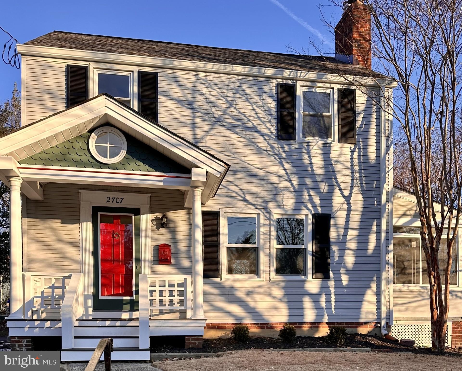 a view of a house with large windows