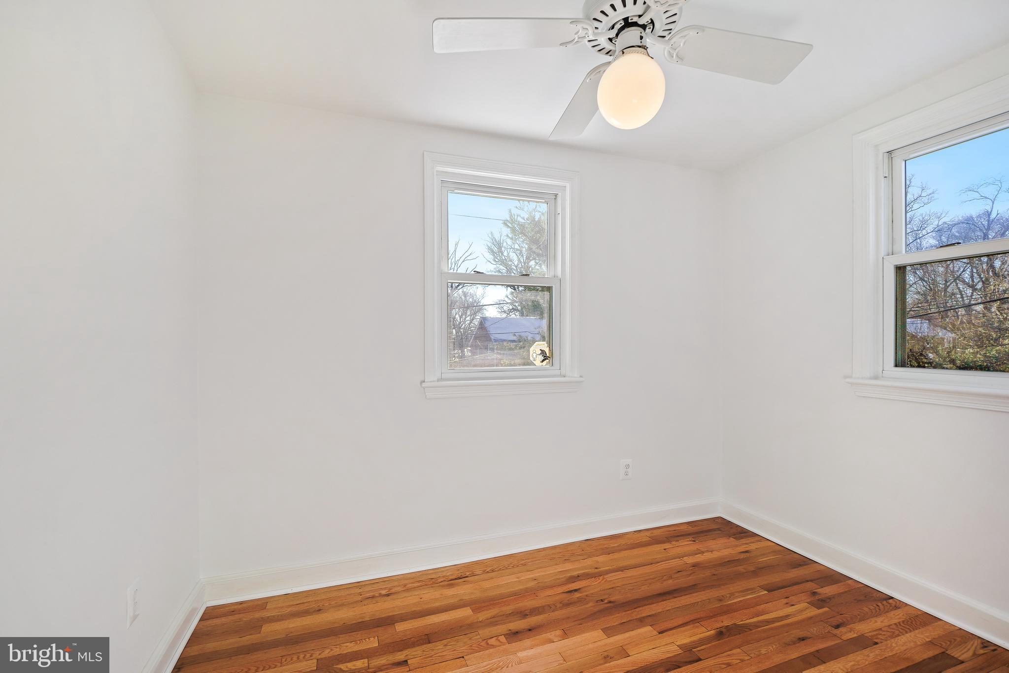 2707 Harmon Road Silver Spring, MD 20902 - Photo 15 of 22 a view of a room with wooden floor and window