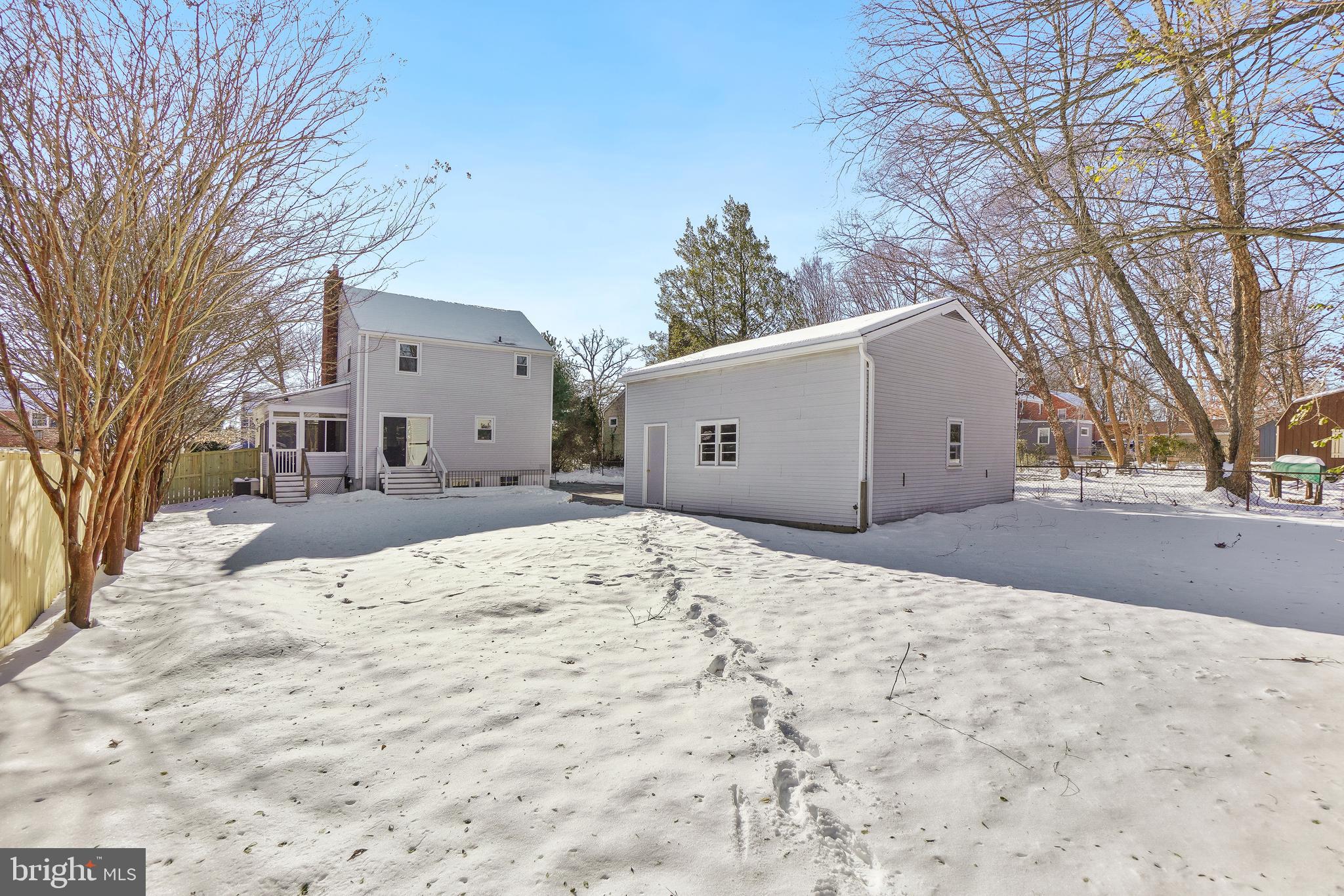 2707 Harmon Road Silver Spring, MD 20902 - Photo 21 of 22 a view of garage yard and covered with snow
